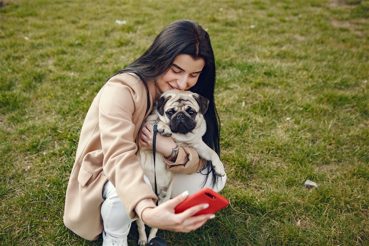 A woman with her pug