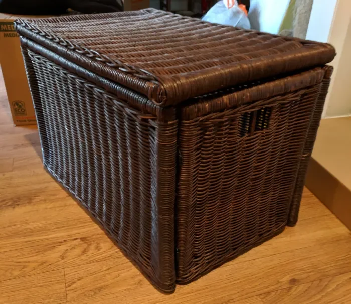 Litter box in a wicker basket