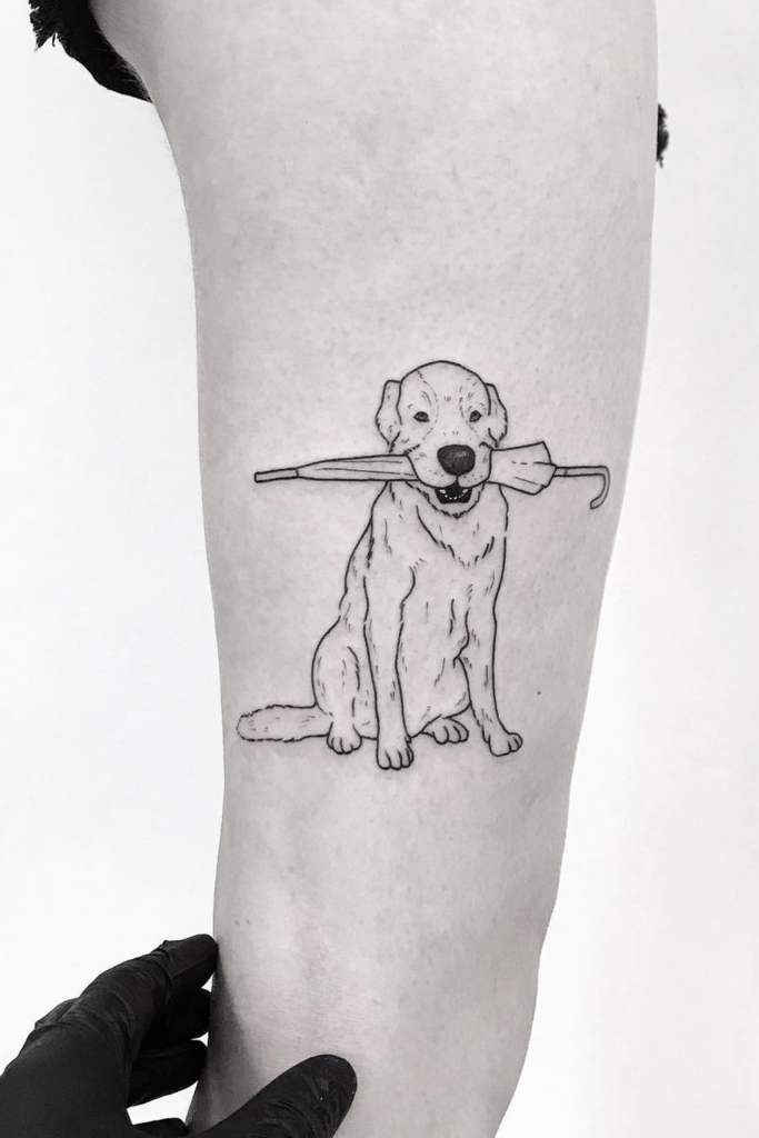 Minimalist line sketch tattoo of a dog holding an umbrella in its mouth