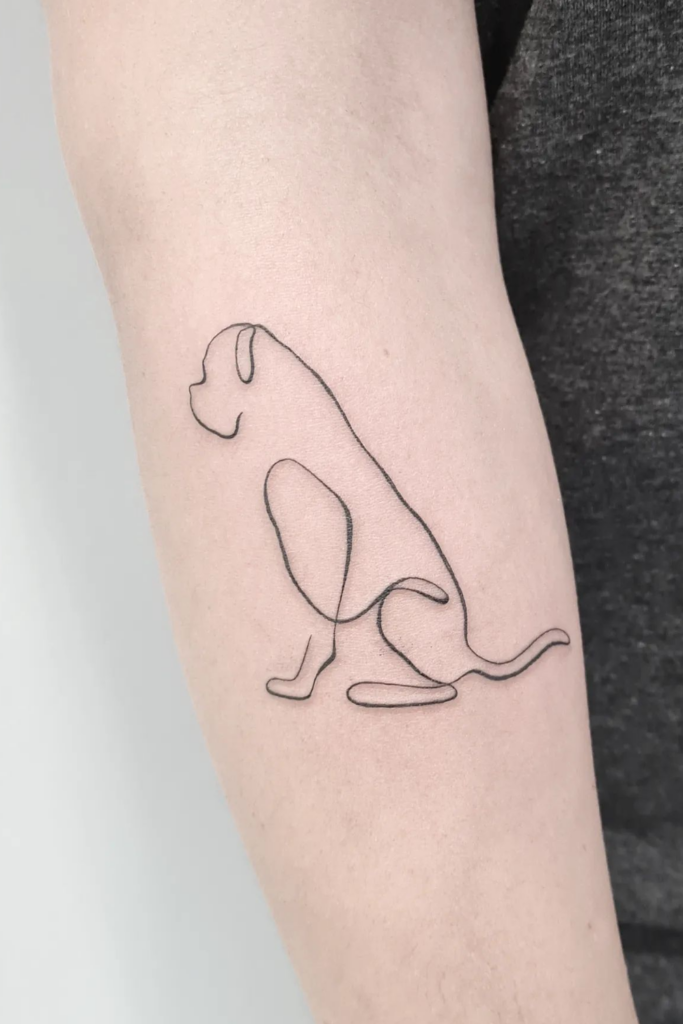 Simple line sketch arm tattoo of a large breed dog