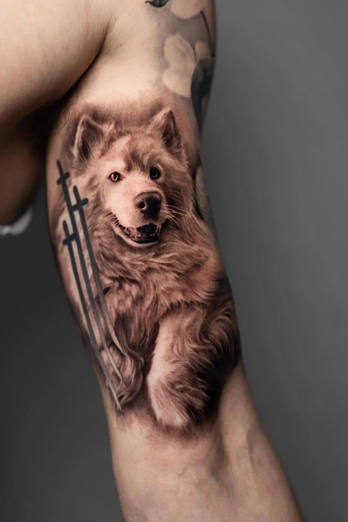 Detailed, realistic dog portrait tattoo with textured fur.