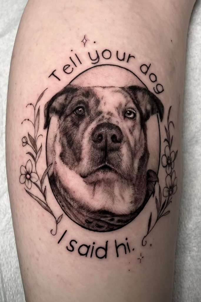 Tattoo honoring a deceased dog, with a message 'tell your dog I said hi'